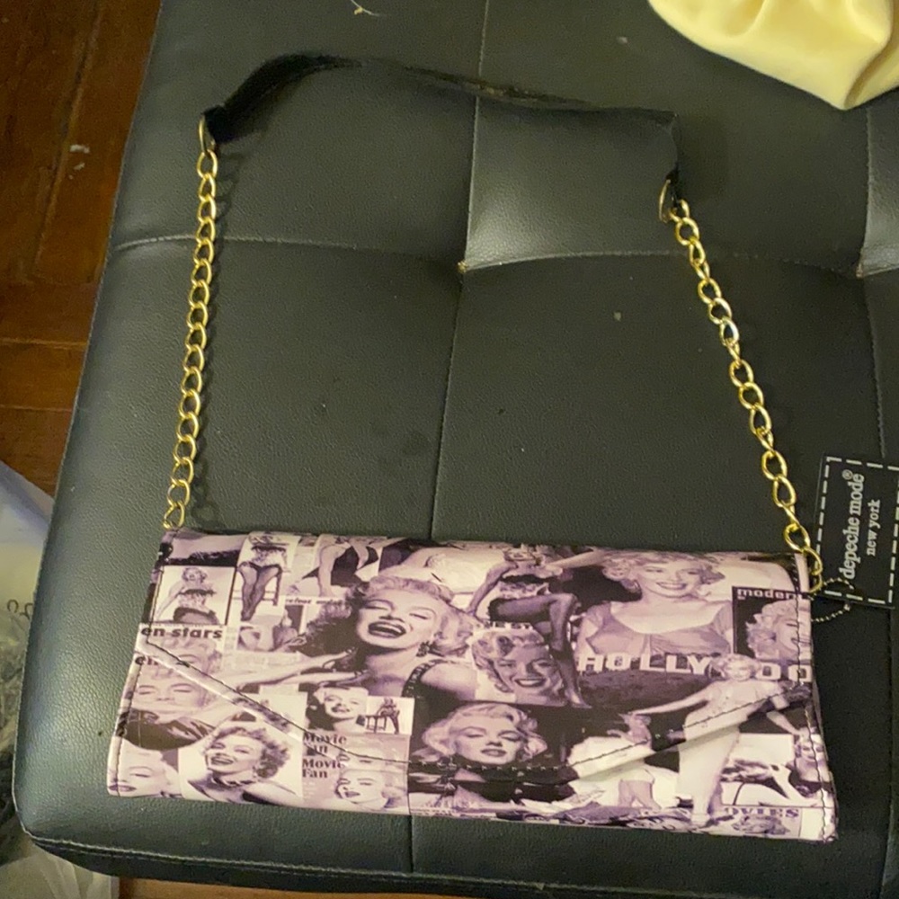 Brand new with tags clutch or strap